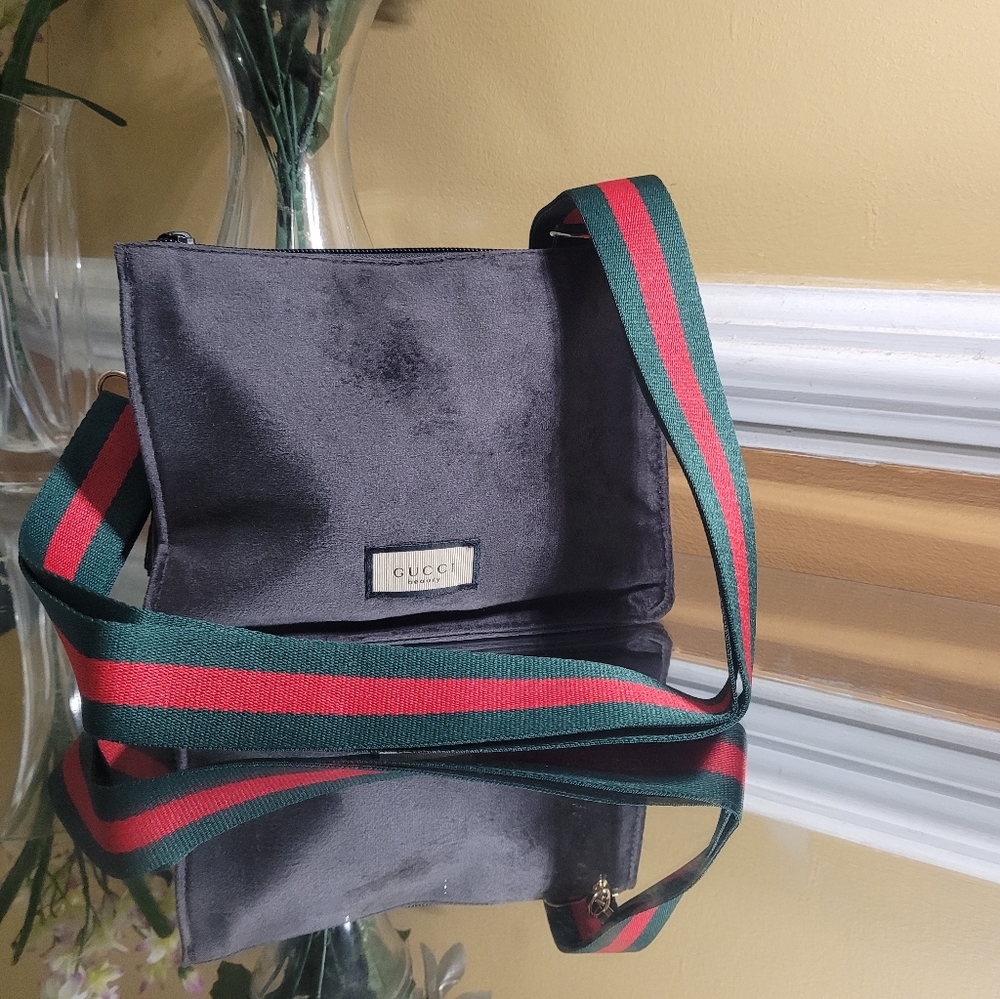Gucci pouch converted into shoulder bag or strap bag. Aftermarket shoulder strap